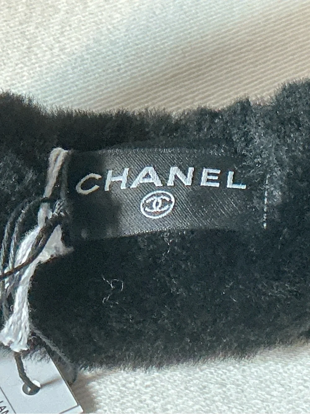 BNIB CHANEL Black White Logo Shearling Lamb Earmuffs